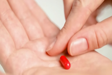Abstract, blur, bokeh background, defocusing - image for the background. Heap of medicine pills. Background from colorful pills and capsules.