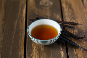 vanilla extract on wooden surface