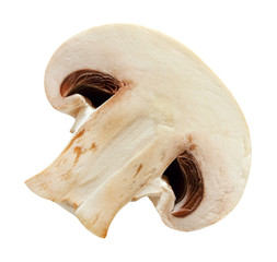 champignon mushroom cut half isolated on white background with clipping path.