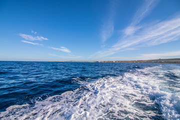 Amazing blue waters of the Mediterranean Sea near Malta near blue grotto from a boat