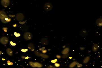 Fototapeta na wymiar Gold and yellow hearts bokeh overlay, hearts photo overlay, abstract background, shiny gold and yellow hearts flowing around. Photo overlay effect, hearts bokeh on black background, JPG file.