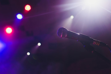 microphone against blur on beverage in pub and restaurant background.