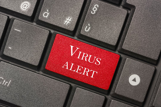Closeup picture of Virus Alert button of a modern keyboard