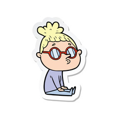 sticker of a cartoon woman wearing glasses