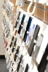 Smartphones on the counter of a electronics store