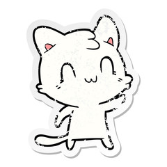 distressed sticker of a cartoon happy cat