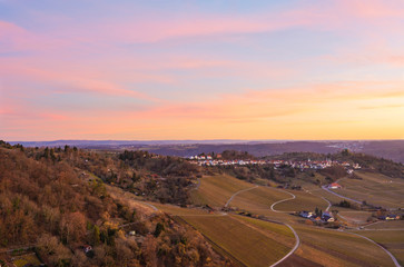 Warm colorful sunset in the metropolitan area of Stuttgart (Baden-Wuerttemberg, Germany). View to...