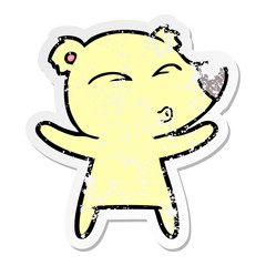 distressed sticker of a cartoon whistling bear with open arms