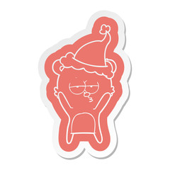 bored bear cartoon  sticker of a wearing santa hat