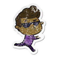 distressed sticker of a cartoon cool guy