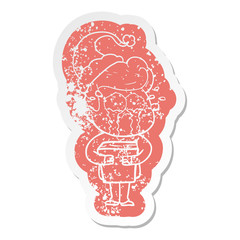 cartoon distressed sticker of a crying man holding book wearing santa hat