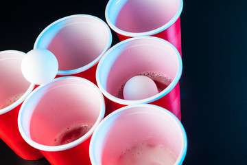 Cups for game Beer Pong on the table