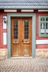 Fototapeta na wymiar old vintage red wooden door Marburg Germany