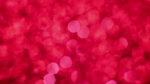 Red Merry Christmas magical bokeh lights background. Glamour happy valentines day walpaper.