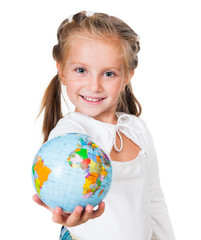 Smiling little girl holding globe isolated on a white background