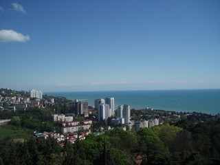 Fototapeta na wymiar view of the city Sochi panorama from the height of the sea and high-rise buildings
