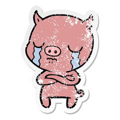 distressed sticker of a cartoon pig crying