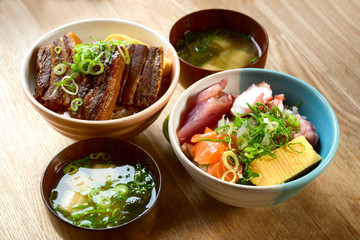 Rice bowl in Japanese style serve with egg roll soup.