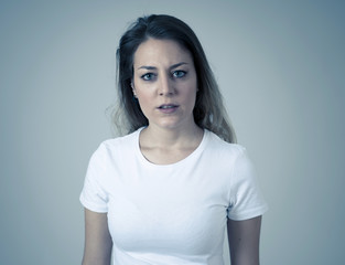 Human expressions and emotions. Desperate young attractive woman with angry face looking furious