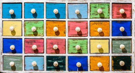 Beautiful old colorful wooden cupboard shelves