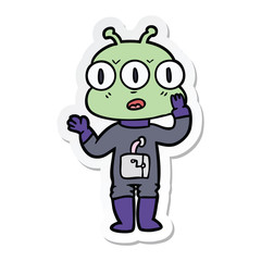 sticker of a cartoon three eyed alien
