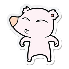sticker of a cartoon whistling bear