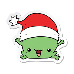 sticker of a cute cartoon christmas frog