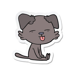 sticker of a cartoon dog sticking out tongue