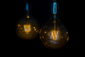 incandescent bulb on a black background