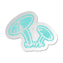 distressed old sticker of some mushrooms