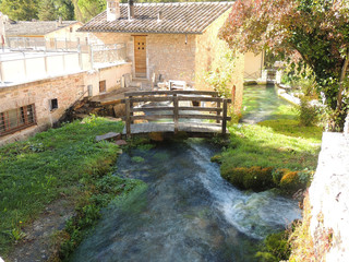 Fototapeta na wymiar Rasiglia, a medieval village in the center of Italy, famous for the streams of water crossing the town. It was called 