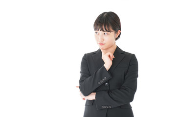 悩むビジネスウーマン