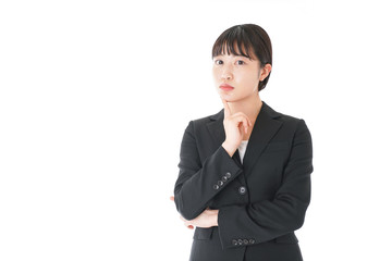 悩むビジネスウーマン