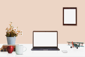 Workspace with modern desktop computer, office supplies flower plant at home or studio. Mock up