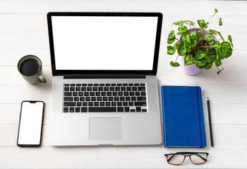 Top view of working place on white table