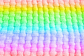 Colorful knitted background with place for text. Texture knitted.