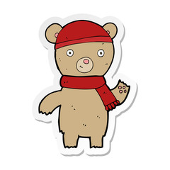 sticker of a cartoon waving teddy bear