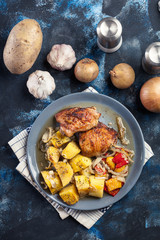 Roasted chicken thighs with potatoes