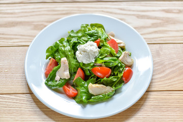 fresh salad with feta cheese and tomato