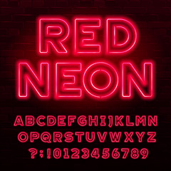 Red neon alphabet font. Red color light bulb capital letters and numbers. Stock vector typeface for your typography design.
