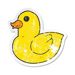 retro distressed sticker of a cartoon rubber duck