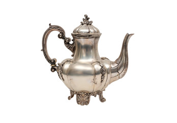 Antique silver kettle on a white background.