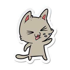 sticker of a cartoon cat hissing