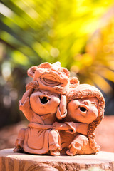 Fototapeta premium Clay doll boy was lion dance