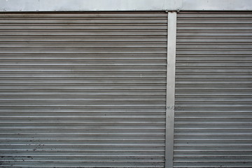Fototapeta premium Old Steel roller shutter doors closed.