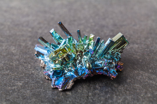 Bismuth crystals on a dark background. This is the most strongly diamagnetic element and also the heaviest that is not radioactive