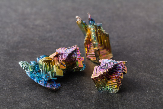 Bismuth crystals on a dark background. This is the most strongly diamagnetic element and also the heaviest that is not radioactive