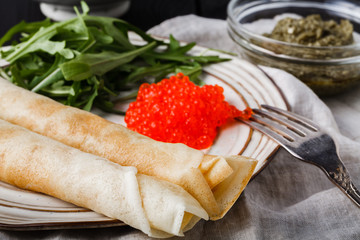 Russian blini - carnival pancakes with red caviar