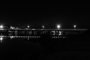 Night view of road bridge over Orange River, Upington. Monochrome