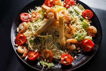 Organic caesar salad with caesar dressing. International food.